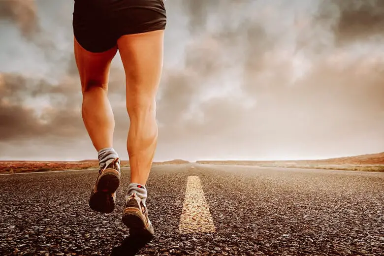 Person running on the empty road - Liverpool in autumn