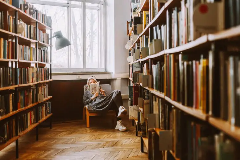 Woman reading in the library - Liverpool in autumn