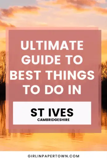 On the foreground you can see text saying Ultimate guide to best things to do in St Ives, Cambridgeshire by girlinpapertown.com while on the background is a beautiful photo of a sunset above the lake in St Ives Fishery