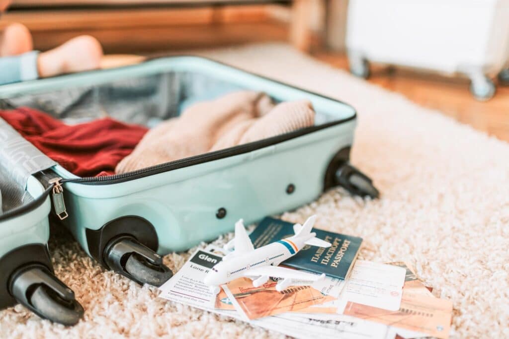packing suitcase - UK travel apps for packing