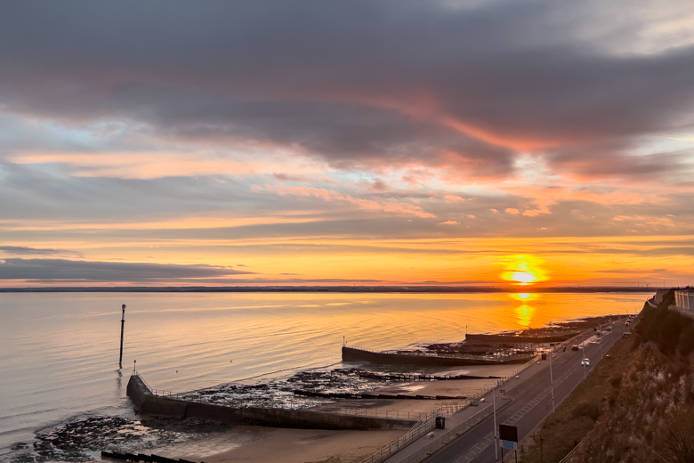 Sunset by the sea in Kent - pros and cons of living in England