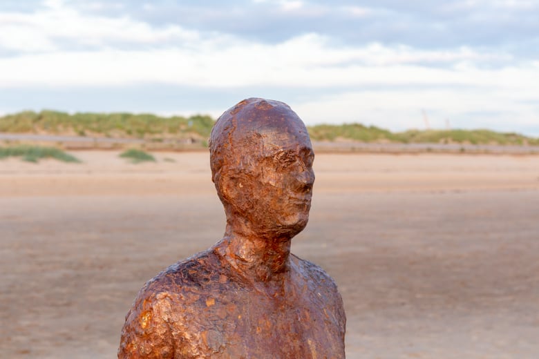 Crosby Beach, the nearest beach to Liverpool - close up of the sculpture, Another Place by Anthony Gormley (featured image)